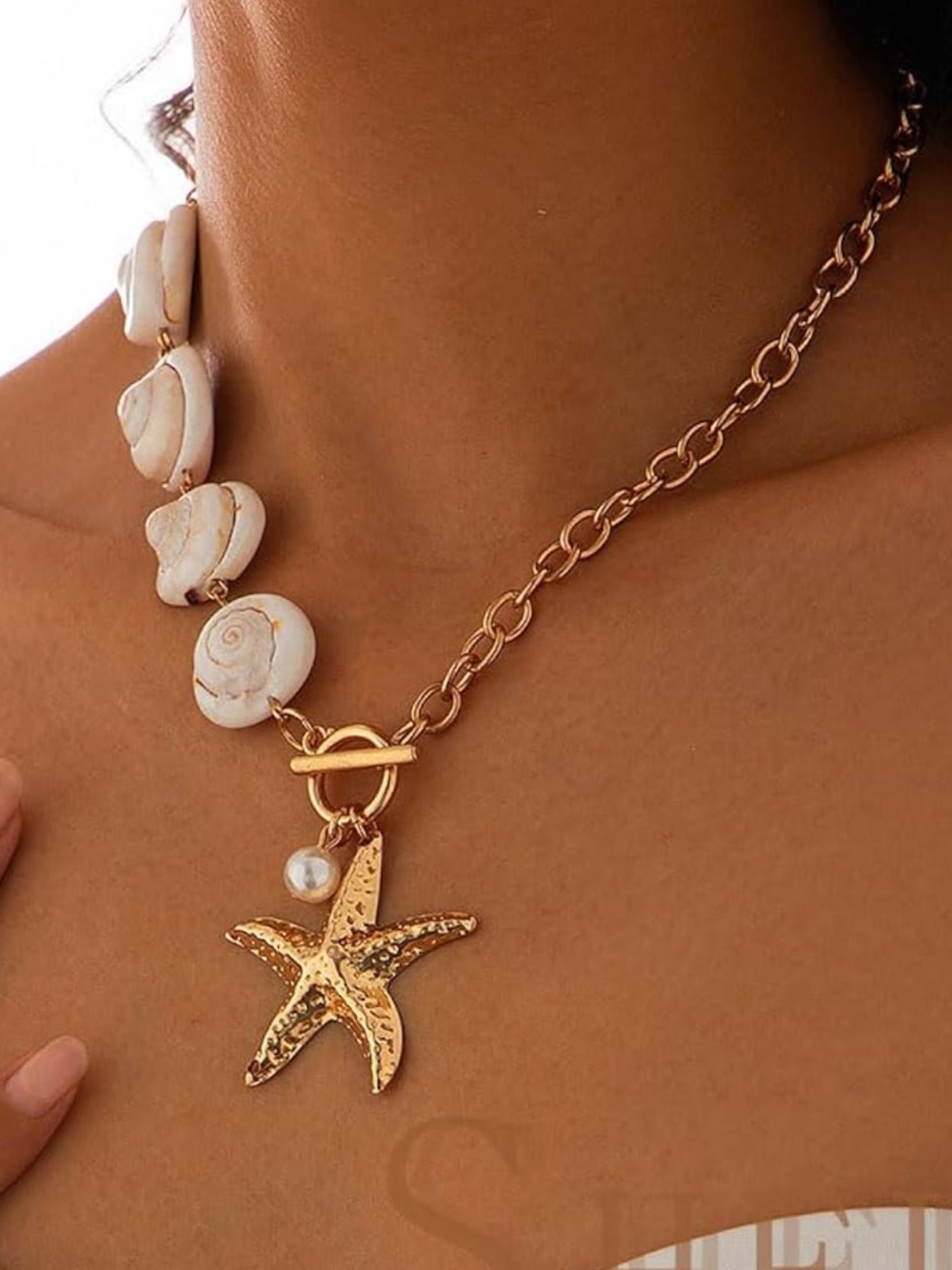 Anthropologie Gold Starfish Pendant Necklace with White Shell Accents